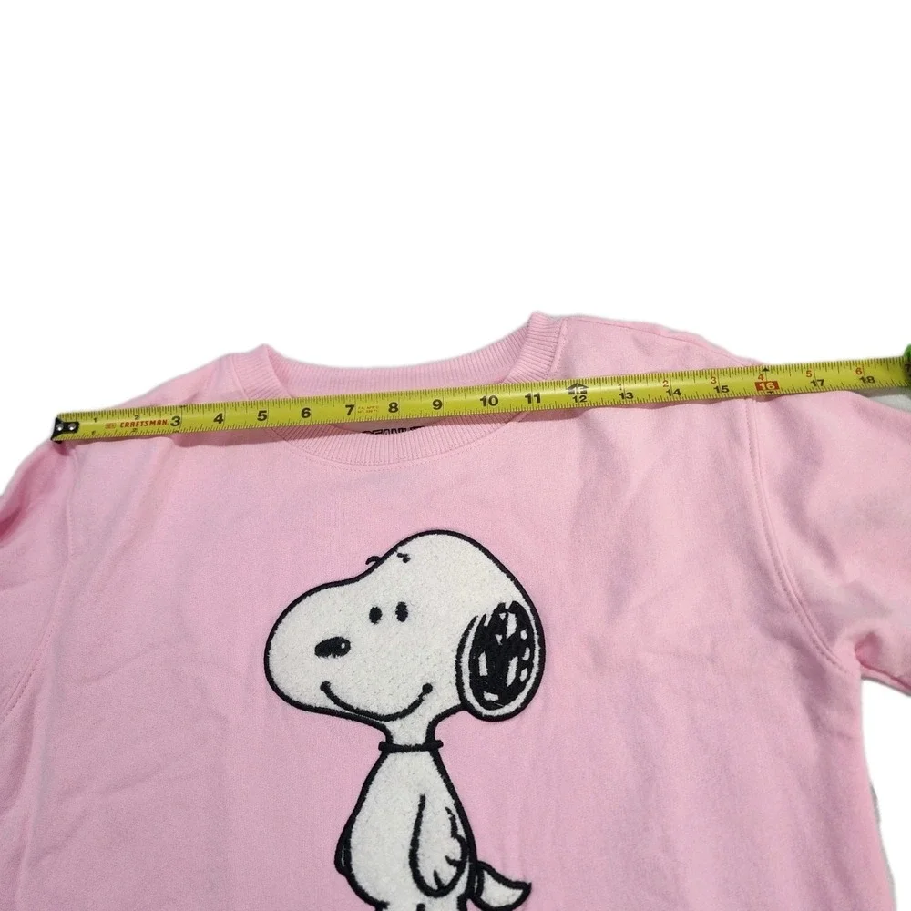 Brand New Peanuts Pink Snoopy Sweater.  Size XL Juniors